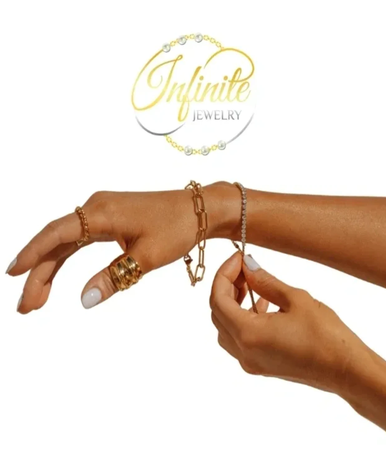 Hands putting on elegant gold bracelet with rings.
